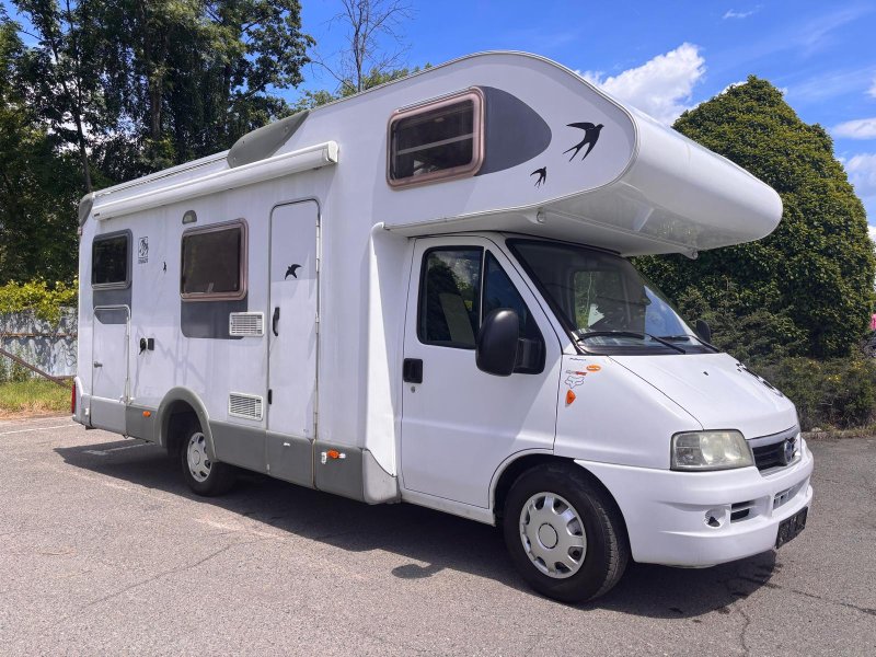 OBYTNÝ AUTOMOBIL KNAUS TRAVEL - klimatizace, tažné, garáž 